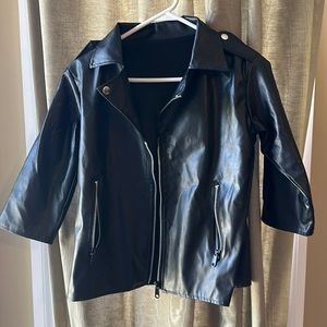 Get ready for Halloween with this new only worn once kids greaser jacket!